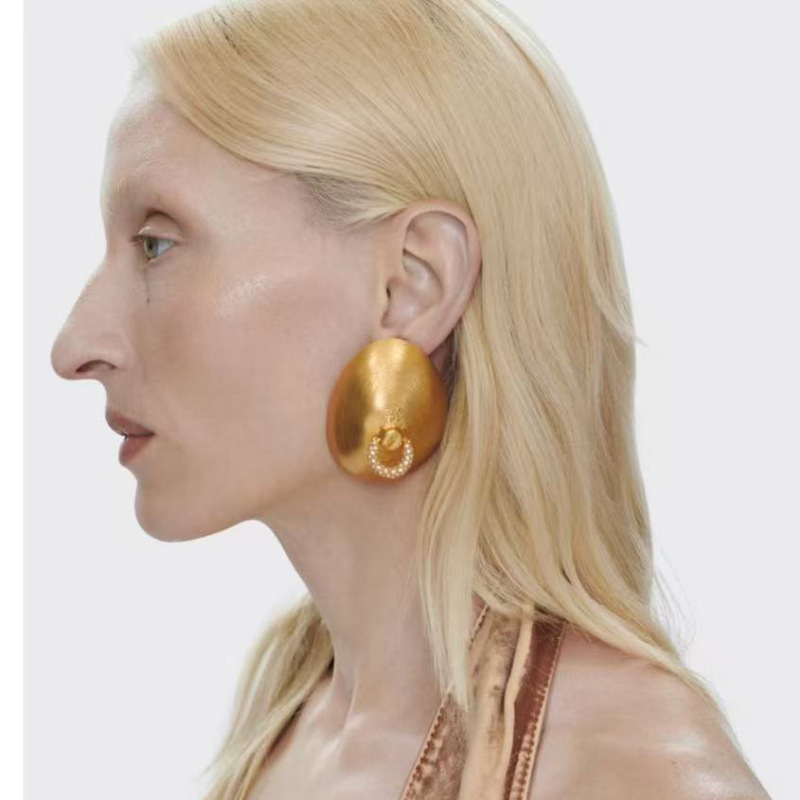 Grandes boucles d'oreilles ron - Vintage Collectible Show avis et prix