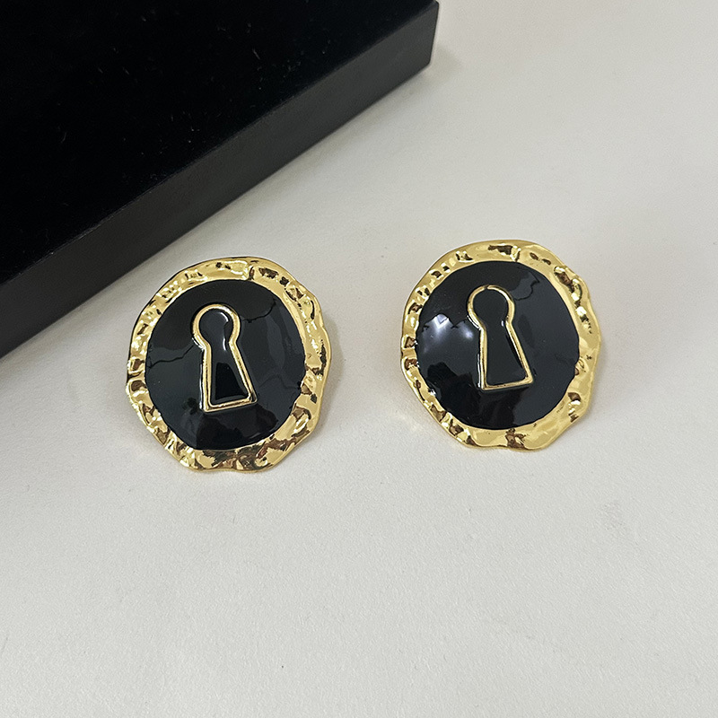 Boucles d'oreilles rondes en a - Vintage Collectible Show avis et prix